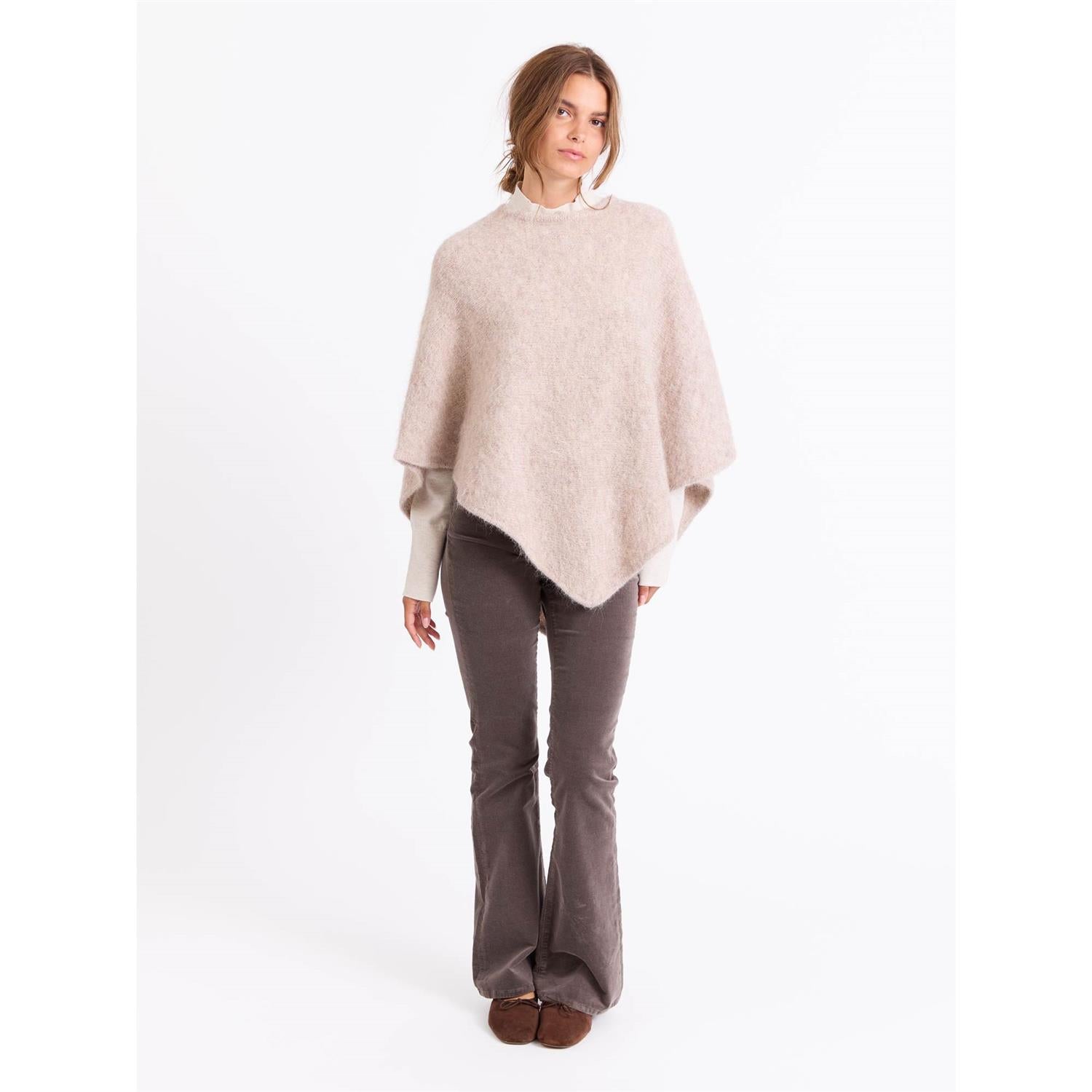 Hanne Poncho/      4